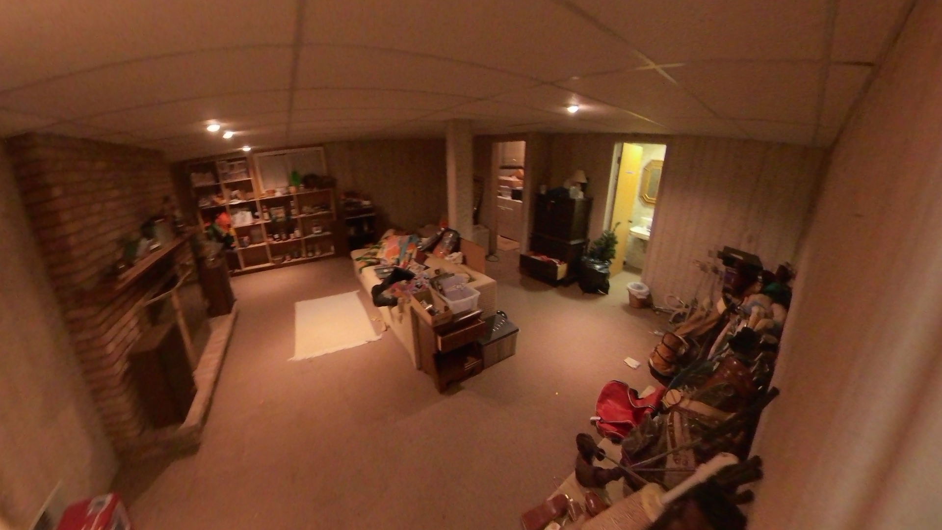 Furnished basement before cleanout